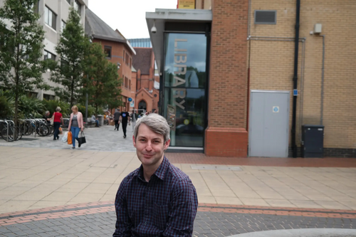 Will Forster outside Woking library